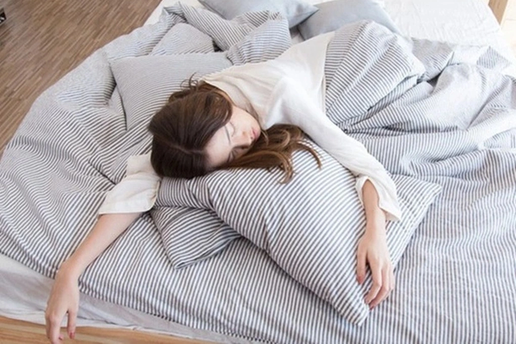 Person sleeping showing the importance of quality sleep for cancer prevention