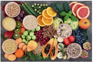 Array of the most powerful cancer-fighting foods including vegetables, berries, and whole grains