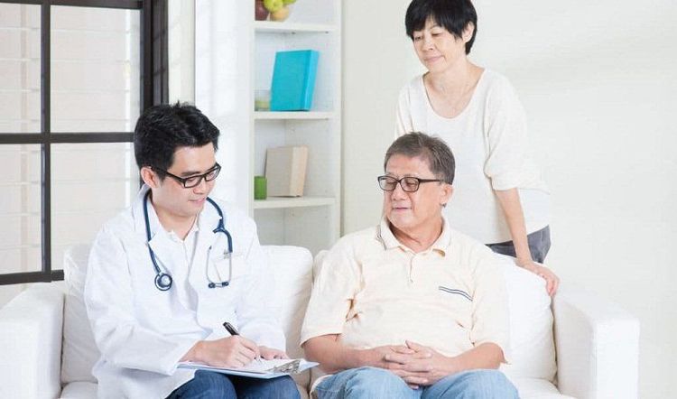 Senior adult with healthcare provider discussing cancer screening options, representing cancer screening for seniors