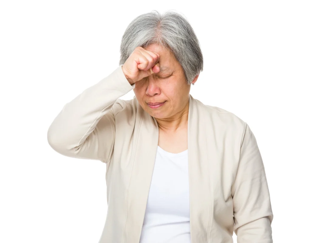 Adult experiencing dizziness or lightheadedness, illustrating how heart problems can cause presyncope and cardiac dizziness