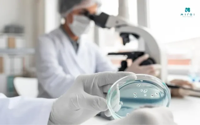 Doctor reviewing cancer screening results with a patient, illustrating the importance of early cancer detection