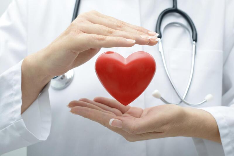 Doctor reviewing cardiac monitoring data on a screen as part of modern heart health monitoring technology