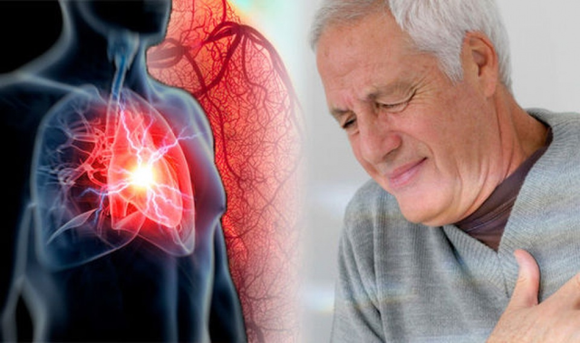 Person experiencing shortness of breath with hand on chest, illustrating cardiac dyspnea and heart health connections