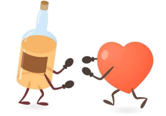 alcohol and blood sugar — glass of red wine next to glucose meter showing how drinking affects blood glucose