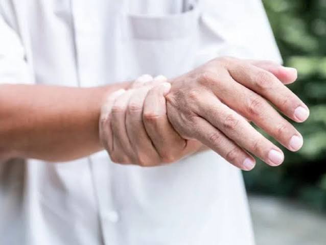 healthcare provider performing monofilament foot sensation test on a patient with diabetic peripheral neuropathy