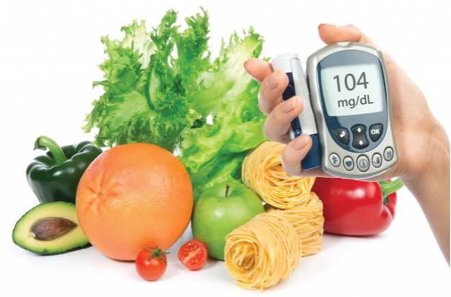 person using glucometer to monitor blood sugar as part of prediabetes screening and diabetes prevention monitoring