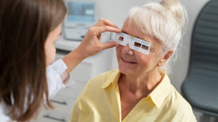 Eye exams for people with diabetes — ophthalmologist performing dilated retinal examination to screen for diabetic retinopathy