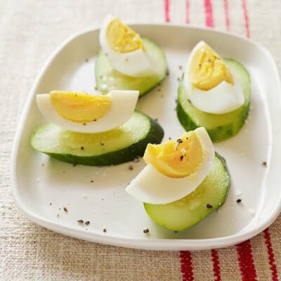 healthy snacks for blood sugar support — nuts, string cheese, celery with almond butter, and berries shown as low-glycemic snack options