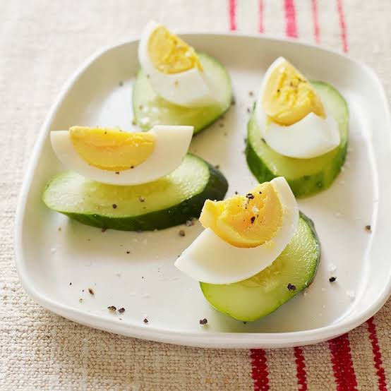 healthy snacks for blood sugar support — nuts, string cheese, celery with almond butter, and berries shown as low-glycemic snack options