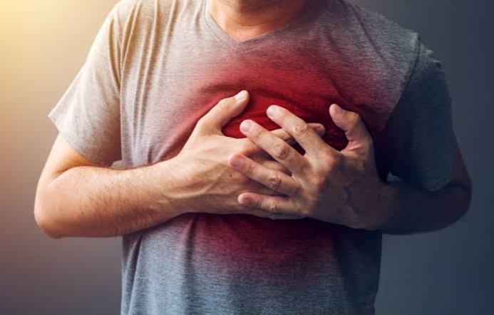 Major risk factors for heart disease — medical diagram showing high blood pressure cholesterol smoking diabetes and obesity