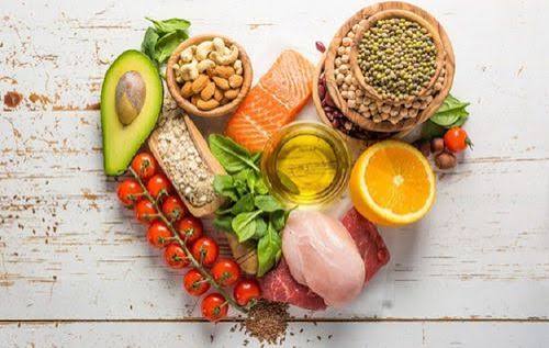 Mediterranean diet meal plan practical guide MEDAS adherence score 14 points weekly pattern legumes whole grains fish nuts EVOO daily servings