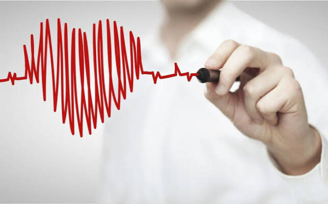 Diagram comparing modifiable vs non-modifiable heart disease risks including age family history smoking and high blood pressure