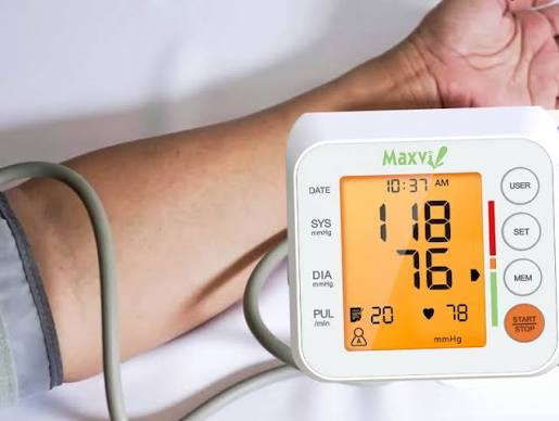 monitoring blood pressure at home seniors upper arm cuff technique target log hypertension management