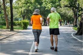 person checking blood glucose reading before and after walking to monitor the effect of walking on blood sugar