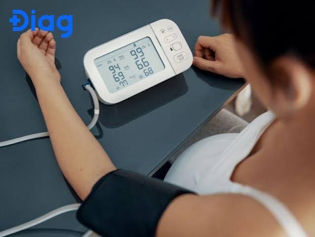 blood pressure log for kidney health — CKD patient recording morning and evening blood pressure readings in a structured daily log