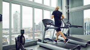 blood sugar and exercise — person checking glucose monitor after workout