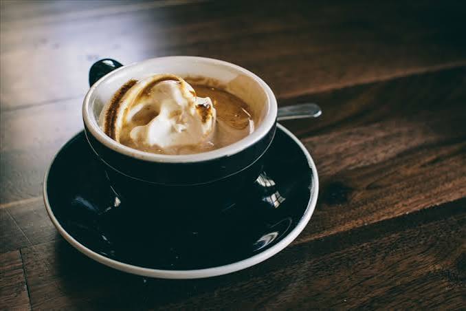 Caffeine and bladder symptoms — coffee cup with bladder irritation concept showing how caffeine increases urgency and frequency in OAB patients