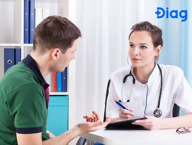 doctor visit checklist for kidney health — CKD patient reviewing prepared questions and lab results before a nephrology appointment