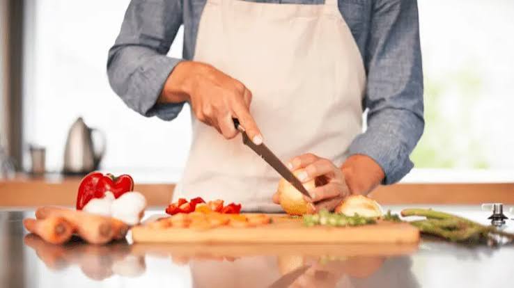eating out with kidney disease — CKD patient reviewing a restaurant menu to find kidney-friendly options