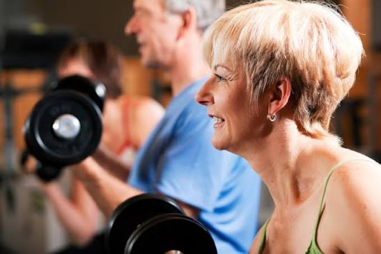 exercise and hypoglycemia prevention — adult checking glucose before workout