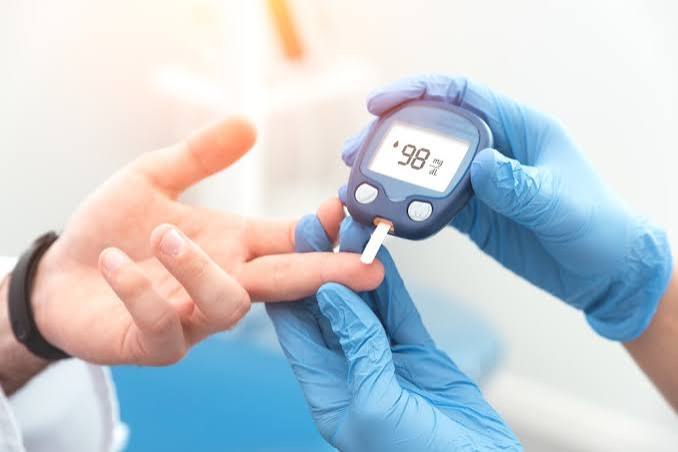 family having a supportive conversation about diabetes management at home