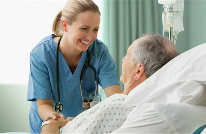 kidney health after age 60 — older adult reviewing kidney function lab results with a nephrologist