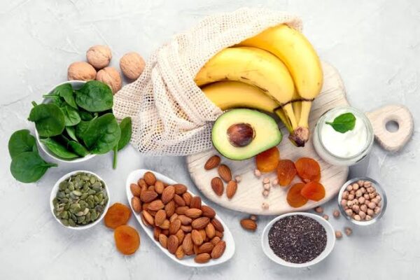reading food labels for kidney health — CKD patient examining nutrition facts panel and ingredient list on packaged food