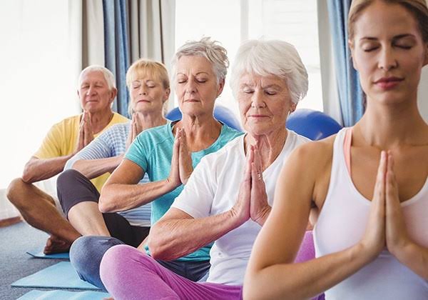safe exercise with diabetes — adult checking blood sugar before workout