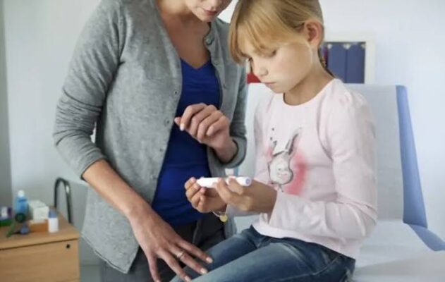 sick-day planning for diabetes — adult resting with glucose meter and hydration on bedside table