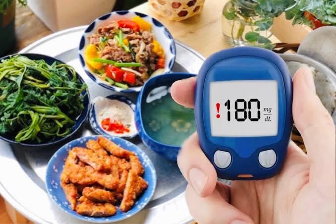 stress eating and blood sugar — person reaching for comfort food under stress