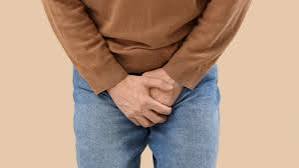 UTI in men — male patient consulting a doctor about urinary tract infection symptoms and treatment
