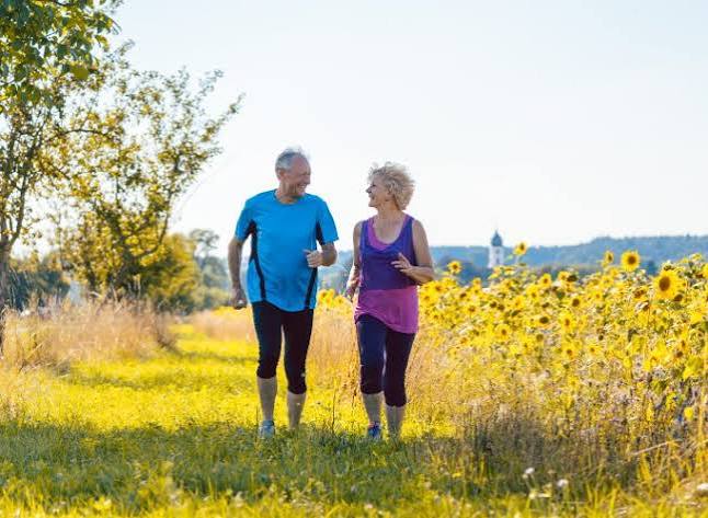 walking after meals for blood sugar support — person on a short walk after lunch