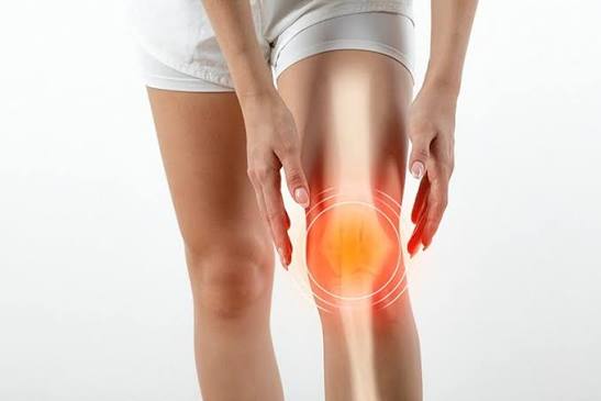 Clicking or popping joints — adult bending knee showing joint crepitus during movement