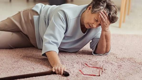 Balance problems and fall risk — older adult with walking aid showing unsteadiness from vestibular disorder or muscle weakness
