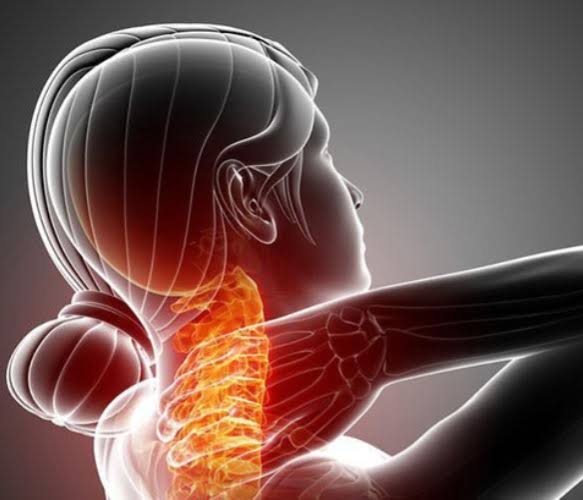 Shoulder pain possible causes — featured image showing person holding painful shoulder with rotator cuff and AC joint anatomy